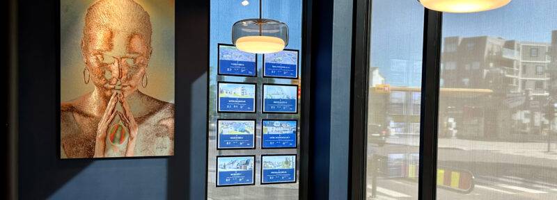 EN LED screens in showcase real estate office